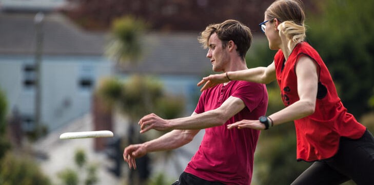 Students playing Ultimate Frisbee