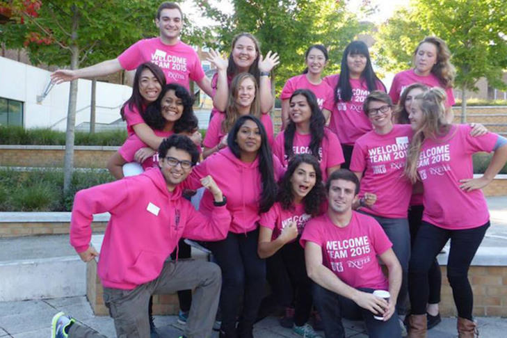 Welcome team wearing pink t-shirts
