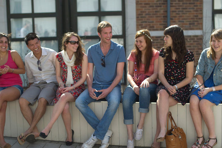 Students sitting outside Streatham Court