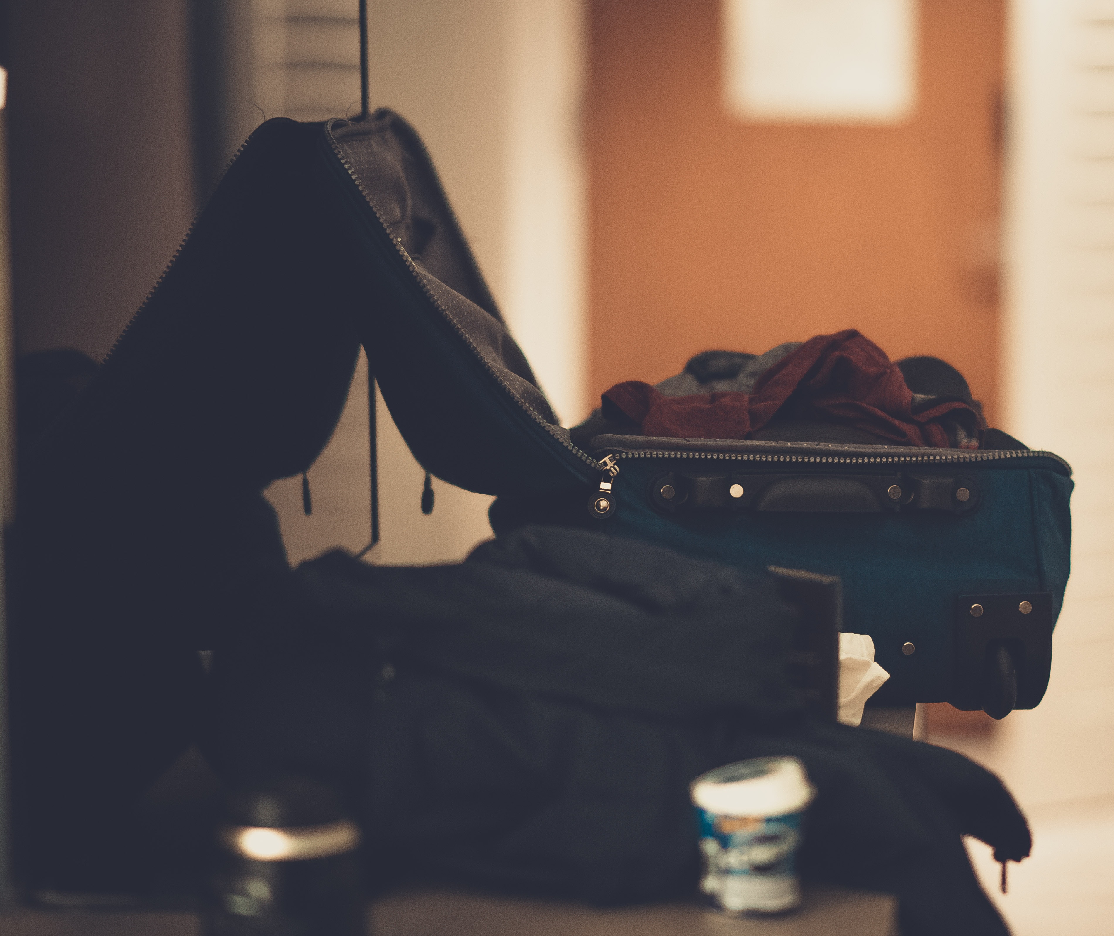Open suitcase with clothes in it 